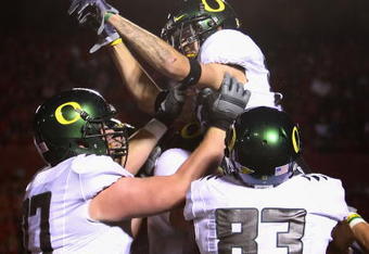 TUCSON, AZ - NOVEMBER 21:  Wide receiver Jeff Maehl #23 of the Oregon Ducks celebrates with teammates after scoring a second quarter touchdown against the Arizona Wildcats during the college football game at Arizona Stadium on November 21, 2009 in Tucson, Arizona.  The Ducks defeated the Wildcats 44-41 in second overtime.  (Photo by Christian Petersen/Getty Images)