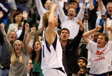 DALLAS - NOVEMBER 18:  Forward Dirk Nowitzki #41 of the Dallas Mavericks reacts after scoring in overtime against the San Antonio Spurs on November 18, 2009 at American Airlines Center in Dallas, Texas.  NOTE TO USER: User expressly acknowledges and agrees that, by downloading and/or using this Photograph, user is consenting to the terms and conditions of the Getty Images License Agreement.  (Photo by Ronald Martinez/Getty Images)