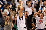 DALLAS - NOVEMBER 18:  Forward Dirk Nowitzki #41 of the Dallas Mavericks reacts after scoring in overtime against the San Antonio Spurs on November 18, 2009 at American Airlines Center in Dallas, Texas.  NOTE TO USER: User expressly acknowledges and agrees that, by downloading and/or using this Photograph, user is consenting to the terms and conditions of the Getty Images License Agreement.  (Photo by Ronald Martinez/Getty Images)