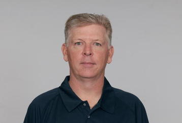 BALTIMORE - 2009:  Cam Cameron of the Baltimore Ravens poses for his 2009 NFL headshot at photo day in Baltimore, Maryland. (Photo by NFL Photos) 