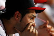 ATLANTA - JUNE 26: Pitcher Mike Gonzalez #51 of the Atlanta Braves looks on from the dugout in the bottom of the ninth inning against the Boston Red Sox at Turner Field on June 26, 2009 in Atlanta, Georgia. (Photo by Kevin C. Cox/Getty Images)