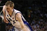BOSTON - MARCH 26:  Kyle Singler #12 of the Duke Blue Devils drives against the Villanova Wildcats during the NCAA Men's Basketball Tournament East Regionals at TD Banknorth Garden on March 26, 2009 in Boston, Massachusetts.  (Photo by Elsa/Getty Images)