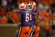 CLEMSON, SC - NOVEMBER 21:  C.J. Spiller #28 of the Clemson Tigers smiles with teammates Jacoby Ford #6 during a 34-21 victory over the Virginia Cavaliers at Memorial Stadium on November 21, 2009 in Clemson, South Carolina.  (Photo by Streeter Lecka/Getty Images)