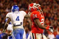 ATHENS, GA - NOVEMBER 21: Washaun Ealey #24 of the Georgia Bulldogs reacts after fumbling the ball inside the five-yard line during the final minutes of their 34-27 loss the Kentucky Wildcats at Sanford Stadium on November 21, 2009 in Athens, Georgia. (Photo by Kevin C. Cox/Getty Images)