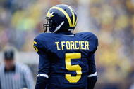 ANN ARBOR, MI - OCTOBER 24: Tate Forcier #5 of the Michigan Wolverines looks on during the game against the Penn State Nittany Lions on October 24, 2009 at Michigan Stadium in Ann Arbor, Michigan. (Photo by Gregory Shamus/Getty Images)