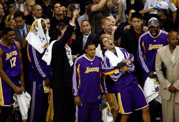 ORLANDO, FL - JUNE 14:  The Los Angeles Lakers bench celebrate in the final moments of their win over the Orlando Magic in Game Five of the 2009 NBA Finals on June 14, 2009 at Amway Arena in Orlando, Florida.  The Lakers won 99-86.  NOTE TO USER:  User expressly acknowledges and agrees that, by downloading and or using this photograph, User is consenting to the terms and conditions of the Getty Images License Agreement.  (Photo by Chris Graythen/Getty Images)