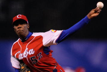 MEXICO CITY - MARCH 10:  Aroldis Chapman #52 of Cuba pitches against Australia during the first inning of the game during the 2009 World Baseball Classic Pool B match on March 10, 2009 at the Estadio Foro Sol in Mexico City, Mexico.  (Photo by Kevork Djansezian/Getty Images)