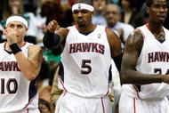 ATLANTA - OCTOBER 28: Mike Bibby #10, Josh Smith #5 and Marvin Williams #24 of the Atlanta Hawks against the Indiana Pacers at Philips Arena on October 28, 2009 in Atlanta, Georgia. (Photo by Kevin C. Cox/Getty Images)