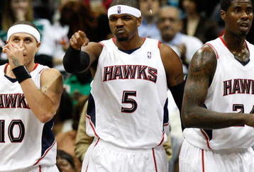 ATLANTA - OCTOBER 28:  Mike Bibby #10, Josh Smith #5 and Marvin Williams #24 of the Atlanta Hawks against the Indiana Pacers at Philips Arena on October 28, 2009 in Atlanta, Georgia.  (Photo by Kevin C. Cox/Getty Images)