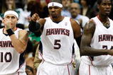 ATLANTA - OCTOBER 28:  Mike Bibby #10, Josh Smith #5 and Marvin Williams #24 of the Atlanta Hawks against the Indiana Pacers at Philips Arena on October 28, 2009 in Atlanta, Georgia.  (Photo by Kevin C. Cox/Getty Images)