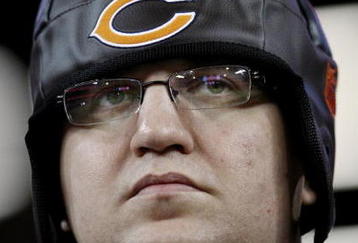 ATLANTA - OCTOBER 18:  A fan of the Chicago Bears watches his team warm up before the game against the Atlanta Falcons at the Georgia Dome on October 18, 2009 in Atlanta, Georgia. (Photo by Kevin C. Cox/Getty Images)