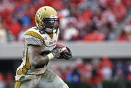 ATHENS, GA - NOVEMBER 29:  Running back Roddy Jones #20 of the Georgia Tech Yellow Jackets ran for 214 yards and 2 touchdowns during the game against the Georgia Bulldogs at Sanford Stadium on November 29, 2008 in Athens, Georgia.  The Yellow Jackets beat the Bulldogs 45-42.  (Photo by Mike Zarrilli/Getty Images)