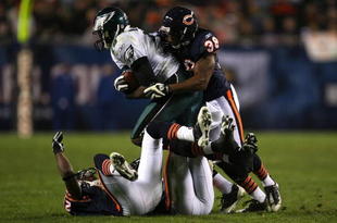 CHICAGO - NOVEMBER 22: Danieal Manning #38 of the Chicago Bears hits and tackles Jeremy Maclin #15 of the Philadelphia Eagles as Maclin makes a reception in the second quarter at Soldier Field on November 22, 2009 in Chicago, Illinois.  (Photo by Jonathan Daniel/Getty Images)