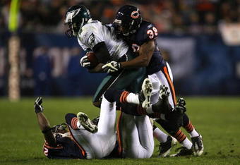CHICAGO - NOVEMBER 22: Danieal Manning #38 of the Chicago Bears hits and tackles Jeremy Maclin #15 of the Philadelphia Eagles as Maclin makes a reception in the second quarter at Soldier Field on November 22, 2009 in Chicago, Illinois.  (Photo by Jonathan Daniel/Getty Images)