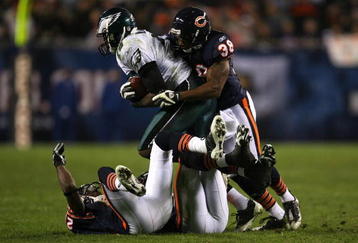 CHICAGO - NOVEMBER 22: Danieal Manning #38 of the Chicago Bears hits and tackles Jeremy Maclin #15 of the Philadelphia Eagles as Maclin makes a reception in the second quarter at Soldier Field on November 22, 2009 in Chicago, Illinois.  (Photo by Jonathan Daniel/Getty Images)