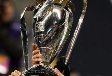 SEATTLE - NOVEMBER 22:  Kyle Beckerman #5 of Real Salt Lake holds the Philip F. Anschutz MLS Cup trophy as he and his teammates celebrate their win over the Los Angeles Galaxy in the MLS Cup final at Qwest Field on November 22, 2009 in Seattle, Washington. Real Salt Lake won 5-4 in a penalty shootout following regulation time.  (Photo by Otto Greule Jr/Getty Images)