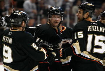 ANAHEIM, CA - NOVEMBER 03:  (L-R) Bobby Ryan #9, Corey Perry #10, Ryan Getzlaf #15  and Scott Niedermayer #27 of the Anaheim Ducks celebrate Perry's first-period goal against the Pittsburgh Penguins at the Honda Center on November 3, 2009 in Anaheim, California.  (Photo by Jeff Gross/Getty Images)
