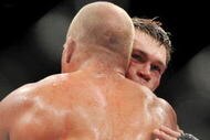 LAS VEGAS - NOVEMBER 21:  Tito Ortiz and Forrest Griffin congratulate each other after Griffin wins their Light Heavyweight Fight at the UFC 106 at Mandalay Bay Events Center on November 21, 2009 in Las Vegas, Nevada. (Photo by Jon Kopaloff/Getty Images)