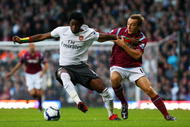 LONDON, ENGLAND - OCTOBER 25: Alexandre Song of Arsenal battles for the ball with Mark Noble of West Ham United during the Barclays Premier League match between West Ham United and Arsenal at Boleyn Ground on October 25, 2009 in London, England. (Photo by Clive Rose/Getty Images)