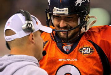 DENVER - NOVEMBER 09:  Head coach Josh McDaniels talks with quarterback Kyle Orton #8 of the Denver Broncos as they face the Pittsburgh Steelers on during NFL action at Invesco Field at Mile High on November 9, 2009 in Denver, Colorado. The Steelers defeated the Broncos 28-10.  (Photo by Doug Pensinger/Getty Images)