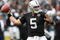 OAKLAND, CA - NOVEMBER 22:  Bruce Gradkowski #5 of the Oakland Raiders passes agaisnt the Cincinnati Bengals during an NFL game at Oakland-Alameda County Coliseum on November 22, 2009 in Oakland, California.  (Photo by Jed Jacobsohn/Getty Images)