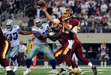 ARLINGTON, TX - NOVEMBER 22:  Quarterback Jason Campbell #17 of the Washington Redskins drops back to pass against the Dallas Cowboys at Dallas Cowboys Stadium on November 22, 2009 in Arlington, Texas.  (Photo by Ronald Martinez/Getty Images)