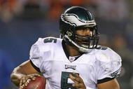 CHICAGO - NOVEMBER 22: Donovan McNabb #5 of the Philadelphia Eagles rolls out to pass against the Chicago Bears at Soldier Field on November 22, 2009 in Chicago, Illinois. The Eagles defeated the Bears 24-20. (Photo by Jonathan Daniel/Getty Images)