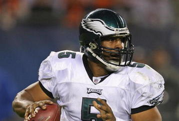 CHICAGO - NOVEMBER 22: Donovan McNabb #5 of the Philadelphia Eagles rolls out to pass against the Chicago Bears at Soldier Field on November 22, 2009 in Chicago, Illinois. The Eagles defeated the Bears 24-20. (Photo by Jonathan Daniel/Getty Images)