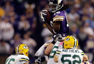 MINNEAPOLIS - OCTOBER 05:  Receiver Sidney Rice #18 of the Minnesota Vikings fields an on-side kick during the Monday Night Football game against the Green Bay Packers on October 5, 2009 at Hubert H. Humphrey Metrodome in Minneapolis, Minnesota.  (Photo by Jamie Squire/Getty Images)