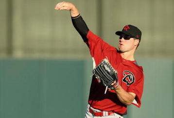 PHOENIX - OCTOBER 16:  Arizona Diamondbacks prospect Cole Gillespie, playing for the Scottsdale Scorpions, warms up in the outfield before the Arizona Fall League game against the Phoenix Desert Dogs at Phoenix Municipal Stadium on October 16, 2009 in Phoenix, Arizona  (Photo by Christian Petersen/Getty Images)
