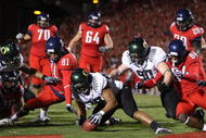 TUCSON, AZ - NOVEMBER 21: Defensive end Will Tukuafu #39 of the Oregon Ducks recovers a fumble from David Roberts #81 of the Arizona Wildcats in the endzone during the college football game at Arizona Stadium on November 21, 2009 in Tucson, Arizona. The Ducks defeated the Wildcats 44-41 in second overtime. (Photo by Christian Petersen/Getty Images)