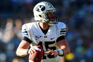 SAN DIEGO - OCTOBER 17: Max Hall #15 of BYU Cougars looks to pass the ball to teamate while playing against San Diego State Aztecs at Qualcomm Stadium on October 17, 2009 in San Diego, California.  (Photo by Jacob de Golish/Getty Images)