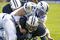 PROVO, UT - OCTOBER 29:  John Rabold #32 and Brad Meissen #36 of Air Force tackle Michael Reed (C) of Brigham Young University during the second quarter October 29, 2005 at LaVell Edwards Stadium in Provo, Utah.  (Photo by George Frey/Getty Images)