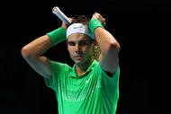 LONDON, ENGLAND - NOVEMBER 23:  Rafael Nadal of Spain reacts during the men's singles first round match against Robin Soderling of Sweden during the Barclays ATP World Tour Finals at the O2 Arena on November 23, 2009 in London, England.  (Photo by Julian Finney/Getty Images)