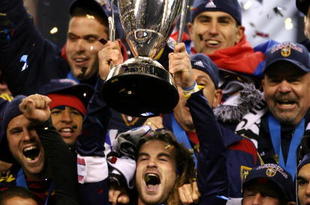 SEATTLE - NOVEMBER 22:  Kyle Beckerman #5 of Real Salt Lake holds the Philip F. Anschutz MLS Cup trophy as he and his teammates celebrate their win over the Los Angeles Galaxy in the MLS Cup final at Qwest Field on November 22, 2009 in Seattle, Washington. Real Salt Lake won 5-4 in a penalty shootout following regulation time.  (Photo by Otto Greule Jr/Getty Images)