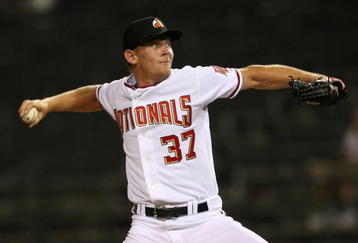 PHOENIX - OCTOBER 16:  Washington Nationals prospect Stephen Strasburg #37, playing for the Phoenix Desert Dogs, pitches in the Arizona Fall League game against the Scottsdale Scorpions at Phoenix Municipal Stadium on October 16, 2009 in Phoenix, Arizona.  (Photo by Christian Petersen/Getty Images)