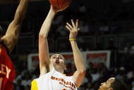 CORAL GABLES, FL - APRIL 01:  Ryan Kelly #4 of the East Team shoots over Avery Bradley Jr. #11 of the West Team in the 2009 McDonald's All American Men's High School Basketball Game at BankUnited Center on April 1, 2009 in Coral Gables, Florida.  (Photo by Doug Benc/Getty Images)
