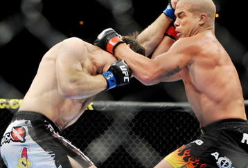 LAS VEGAS - NOVEMBER 21: Tito Ortiz (R) battles Forrest Griffin (L) during their Light Heavyweight Fight at the UFC 106 at Mandalay Bay Events Center on November 21, 2009 in Las Vegas, Nevada. (Photo by Jon Kopaloff/Getty Images)