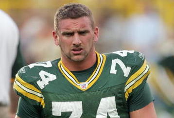 GREEN BAY, WI - AUGUST 23:  Aaron Kampman #74 of the Green Bay Packers looks on before the game against the Jacksonville Jaguars on August 23, 2007 at Lambeau Field in Green Bay, Wisconsin. (Photo by Jonathan Daniel/Getty Images)