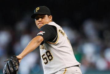 HOUSTON - AUGUST 26:  Romulo Sanchez #58 of the Pittsburgh Pirates pitches in relief in the seventh inning of the MLB game against the Houston Astros on August 26, 2007 at Minute Maid Park in Houston, Texas.  (Photo by Bob Levey/Getty Images)