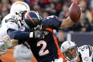 DENVER - NOVEMBER 22:  Quarterback Chris Simms #2 of the Denver Broncos is sacked by Kevin Burnett #99 and Eric Weddle #32 of the San Diego Chargers during NFL action at Invesco Field at Mile High on November 22, 2009 in Denver, Colorado.  (Photo by Doug Pensinger/Getty Images)
