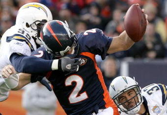 DENVER - NOVEMBER 22:  Quarterback Chris Simms #2 of the Denver Broncos is sacked by Kevin Burnett #99 and Eric Weddle #32 of the San Diego Chargers during NFL action at Invesco Field at Mile High on November 22, 2009 in Denver, Colorado.  (Photo by Doug Pensinger/Getty Images)