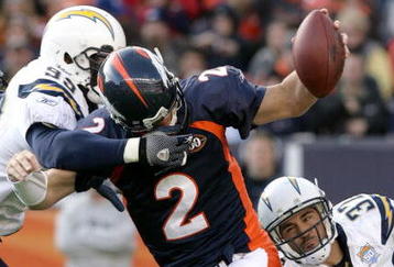 DENVER - NOVEMBER 22:  Quarterback Chris Simms #2 of the Denver Broncos is sacked by Kevin Burnett #99 and Eric Weddle #32 of the San Diego Chargers during NFL action at Invesco Field at Mile High on November 22, 2009 in Denver, Colorado.  (Photo by Doug Pensinger/Getty Images)