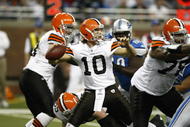 DETROIT, MI - NOVEMBER 22: Brady Quinn #10 of the Cleveland Browns looks to pass the football against the Detroit Lions at Ford Field on November 22, 2009 in Detroit, Michigan. The Lions came from behind to defeat the Browns 38-37. (Photo by Joe Robbins/Getty Images)