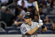 NEW YORK - OCTOBER 09: Joe Mauer #7 of the Minnesota Twins bats against the New York Yankees in Game Two of the ALDS during the 2009 MLB Playoffs at Yankee Stadium on October 9, 2009 in the Bronx borough of New York City. (Photo by Jim McIsaac/Getty Images)