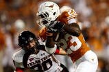 AUSTIN, TX - SEPTEMBER 19:  Running back Tre' Newton #23 of the Texas Longhorns runs for a touchdown against Brett Dewhurst #30 of the Texas Tech Red Raiders at Darrell K Royal-Texas Memorial Stadium on September 19, 2009 in Austin, Texas.  (Photo by Ronald Martinez/Getty Images)