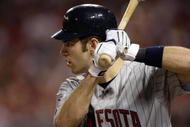 ST. LOUIS, MO - JULY 14:  American League All-Star Joe Mauer of the Minnesota Twins bats during the 2009 MLB All-Star Game at Busch Stadium on July 14, 2009 in St Louis, Missouri. (Photo by Jamie Squire/Getty Images)