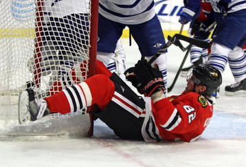 CHICAGO - NOVEMBER 13: Tomas Kopecky #82 of the Chicago Blackhawks hits the goal post during a game against the Toronto Maple Leafs at the United Center on November 13, 2009 in Chicago, Illinois. The Blackhawks defeated the Maple Leafs 3-2. (Photo by Jonathan Daniel/Getty Images)