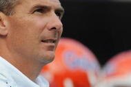 GAINESVILLE, FL - NOVEMBER 21: Coach Urban Meyer of the Florida Gators directs play against the Florida International University Golden Panthers, November 21, 2009 at Ben Hill Griffin Stadium in Gainesville, Florida.  (Photo by Al Messerschmidt/Getty Images)
