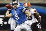 DETROIT, MI - NOVEMBER 22: Matthew Stafford #9 of the Detroit Lions passes the football while under pressure against the Cleveland Browns at Ford Field on November 22, 2009 in Detroit, Michigan. The Lions came from behind to defeat the Browns 38-37. (Photo by Joe Robbins/Getty Images)